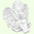 Статуэтка Ангел сидит мечтает крылья сложены Статуэтка Ангел сидит мечтает крылья сложены